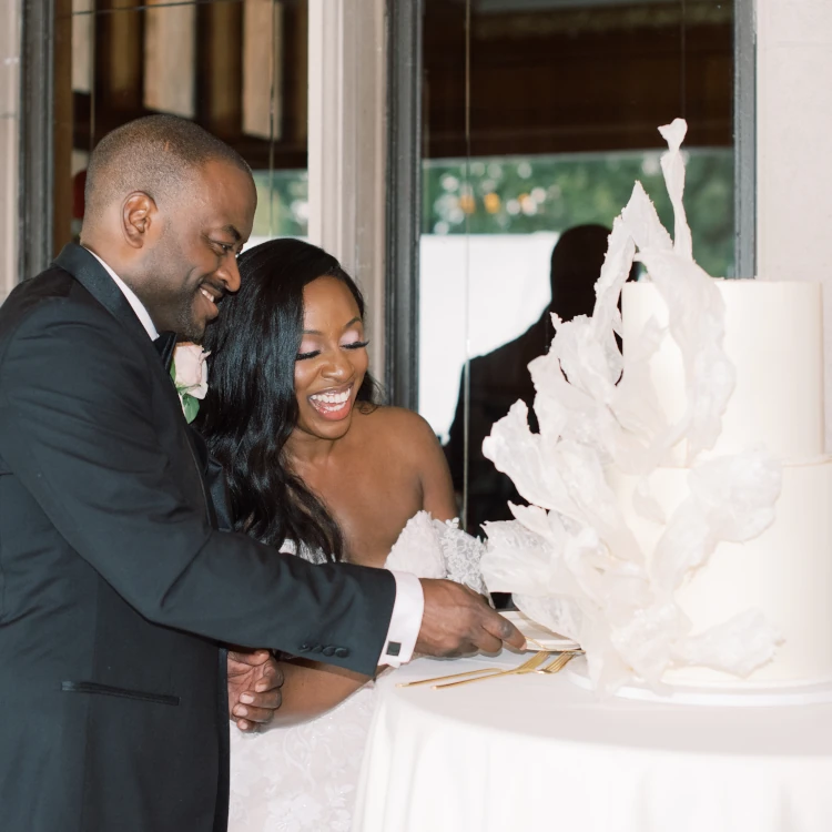 Wedding couple cutting white wafer paper wedding cake, Dyer, IN, by Nadiya's Cupcakes